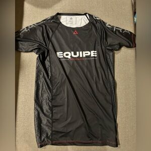 Equine black men’s/unisex training rashguard. Short sleeved.  Never worn. small